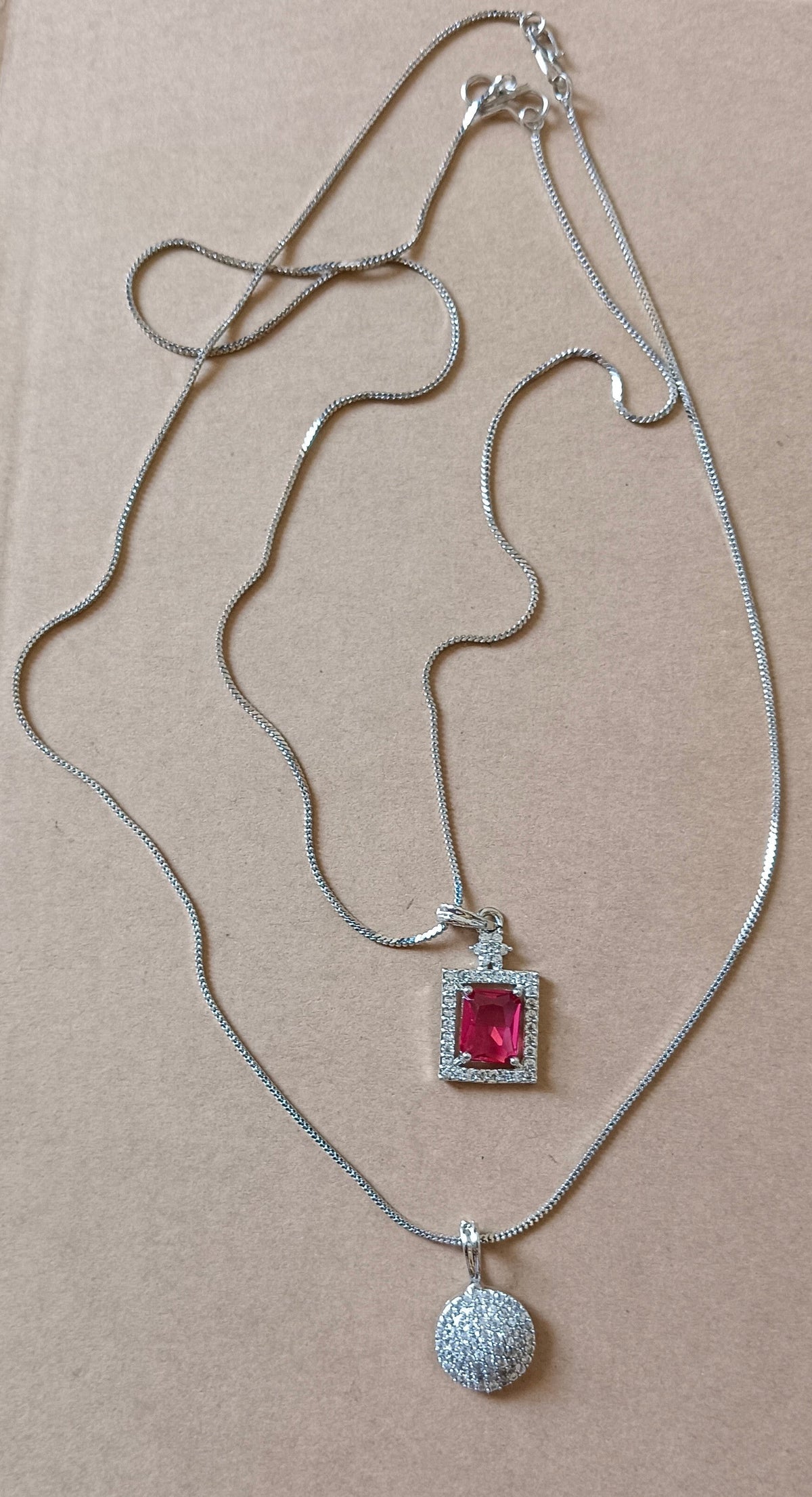 Pack of 2 Pendant Chains with 1 Silver Plated AD Studded Red Pendant and 1 Diamond Circle Shaped Pendant Chain