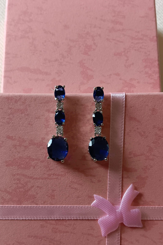 Blue Drop Shaped American Diamond Triple Stone Dangler Earrings