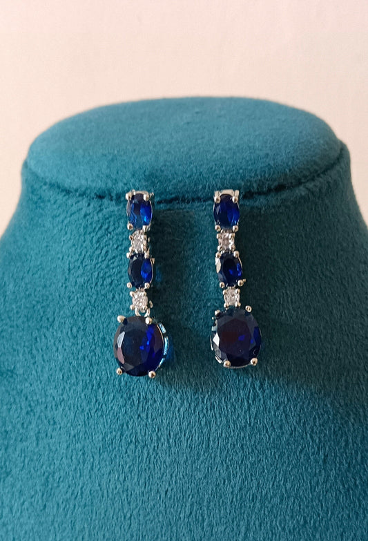 Blue Drop Shaped American Diamond Triple Stone Dangler Earrings