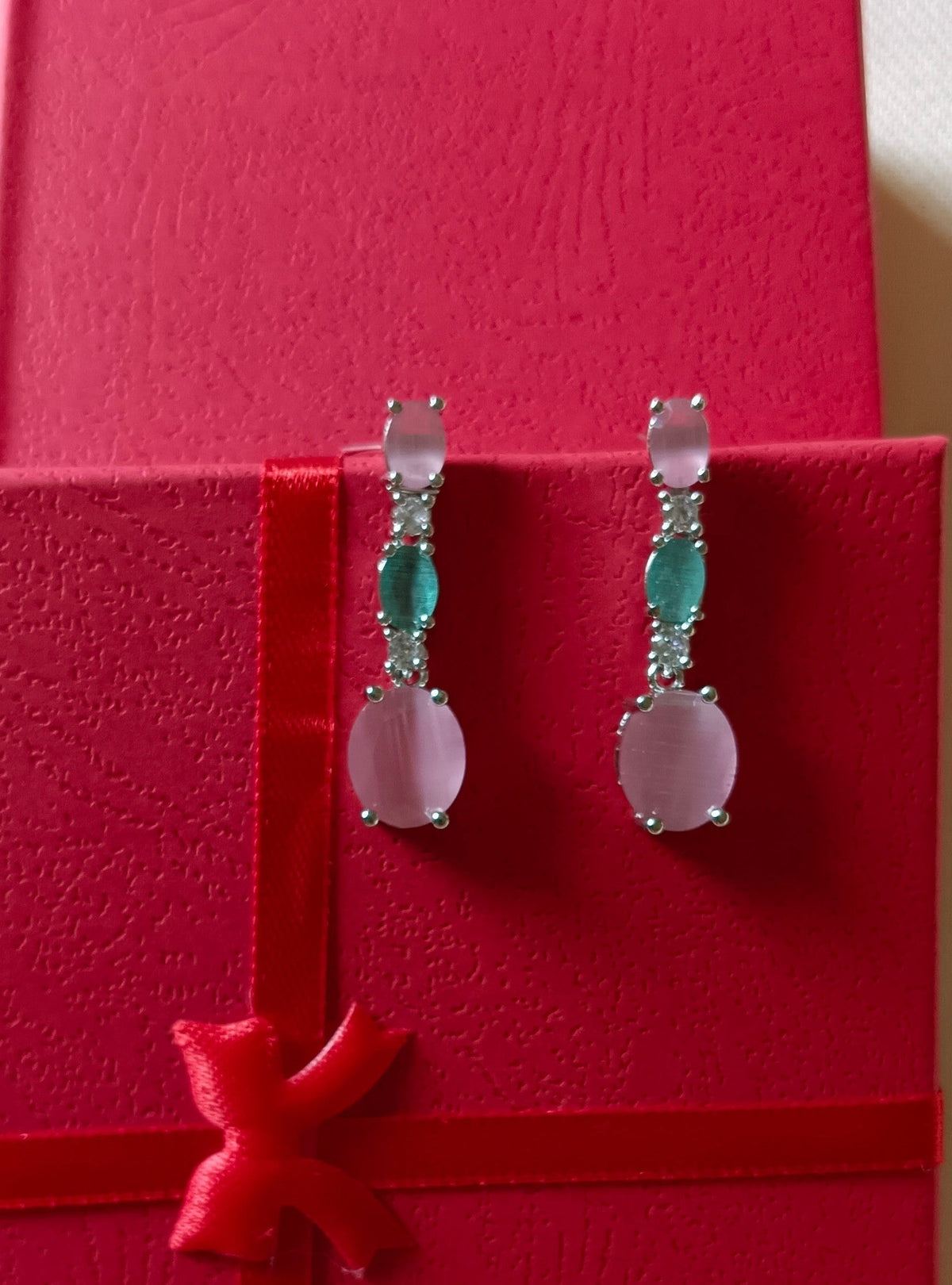 Pink and Mint Green Drop Shaped American Diamond Triple Stone Dangler Earrings