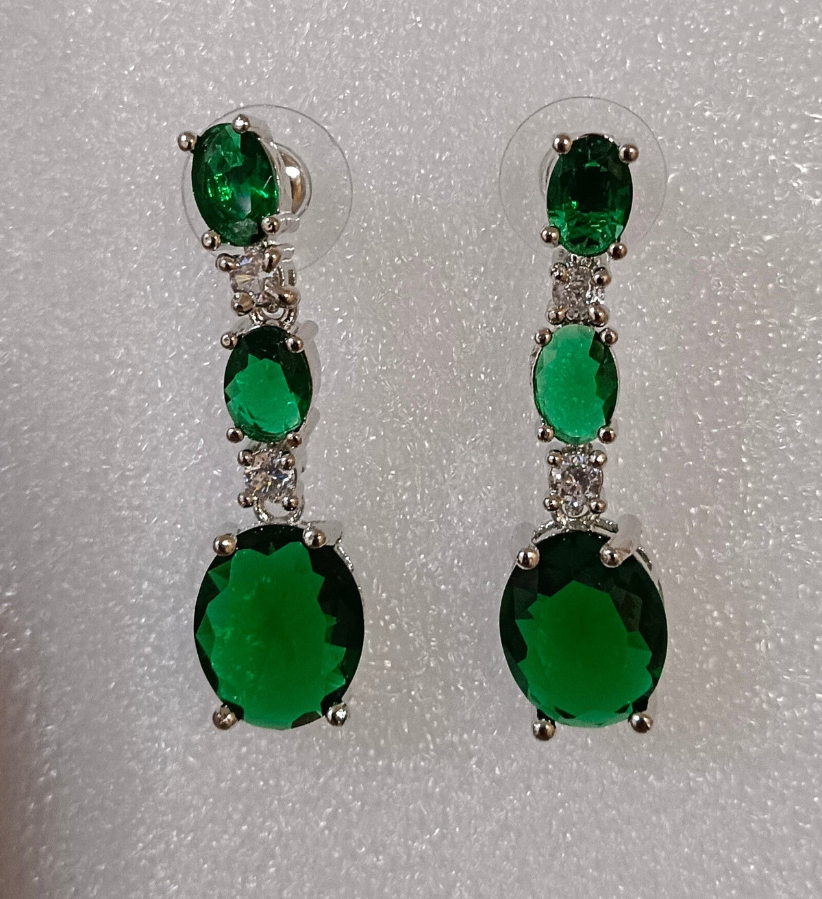 Green Drop Shaped American Diamond Triple Stone Dangler Earrings