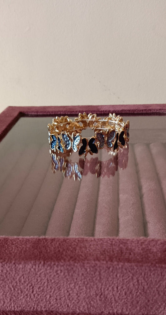 Gold Finish Anti Tarnish Alloy Dark Blue Colored Butterfly Panels Stretch Bracelet