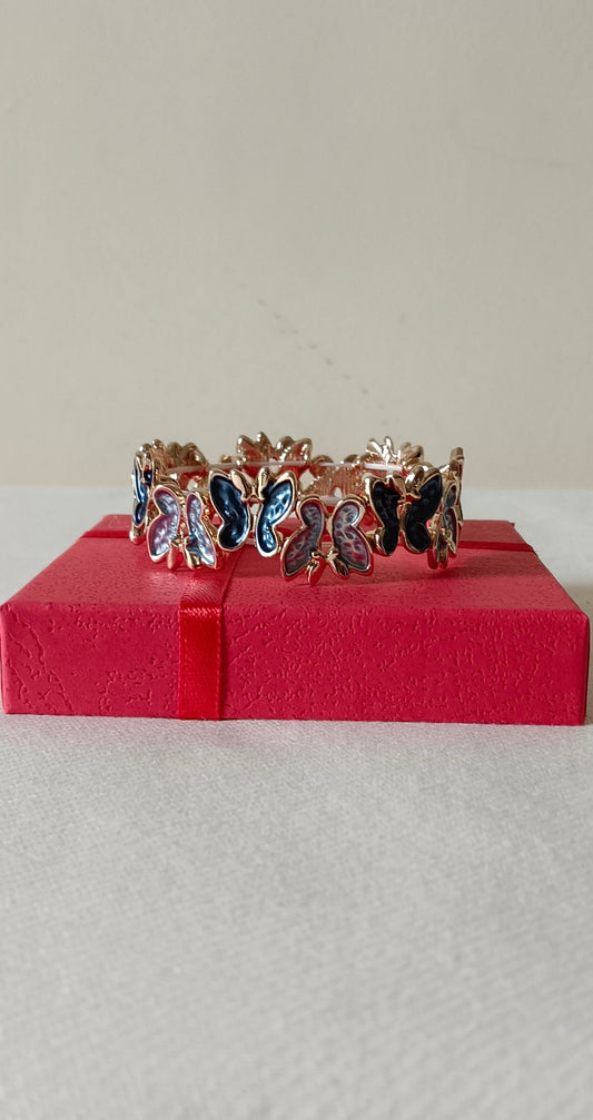 Gold Finish Anti Tarnish Alloy Dark Blue Colored Butterfly Panels Stretch Bracelet
