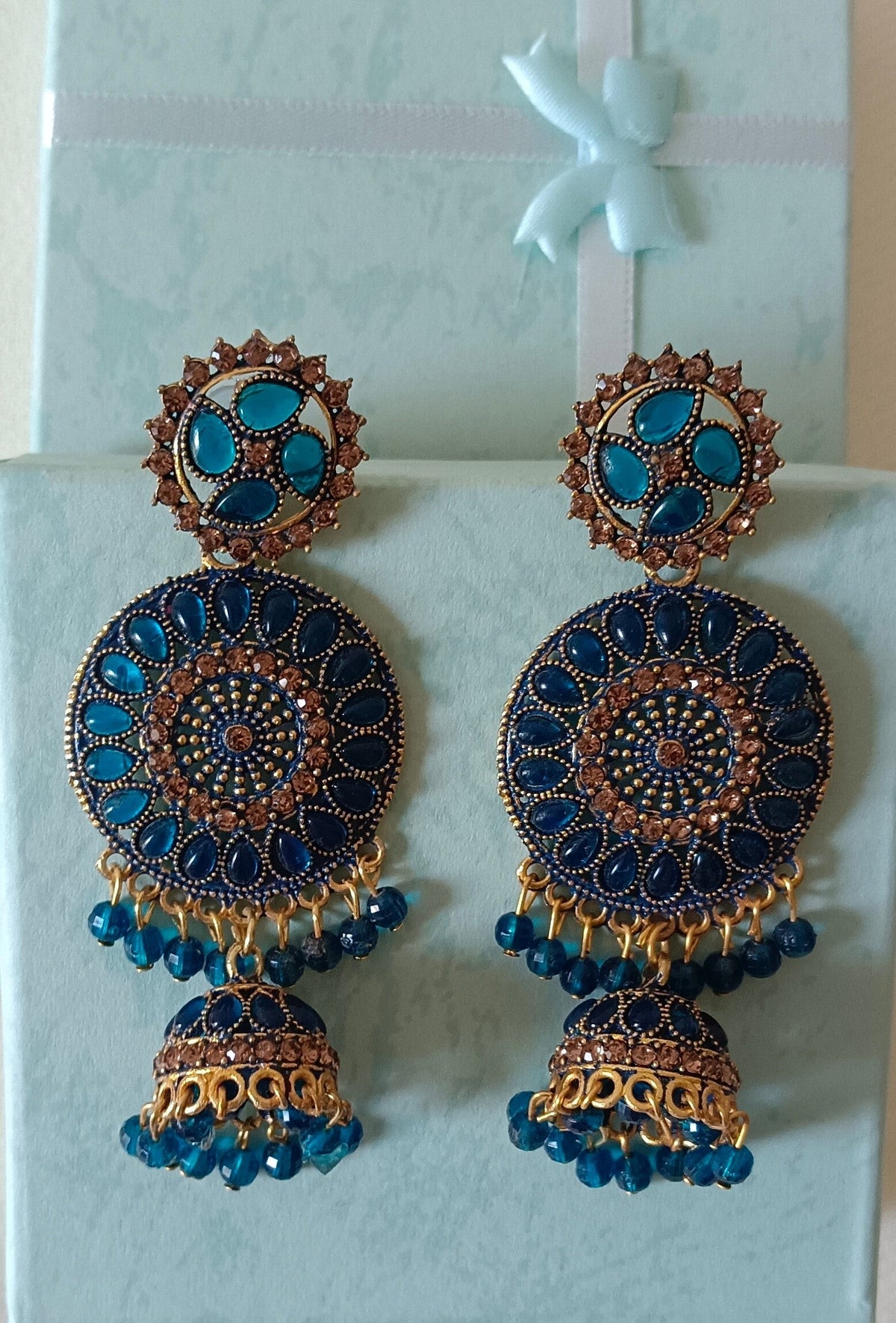 Gold Plated Floral Design Blue Crunchy Jhumka Earrings