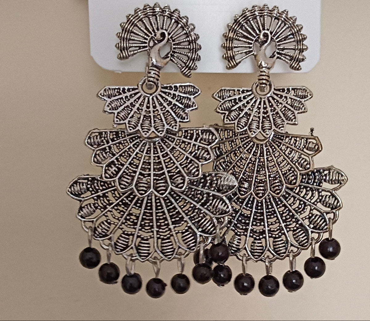 Pack of 2 Oxidized Silver Peacock 3 layer dangling Black Jhumka and Gold Toned Red Sui Dhaga Style Jhumki Earrings