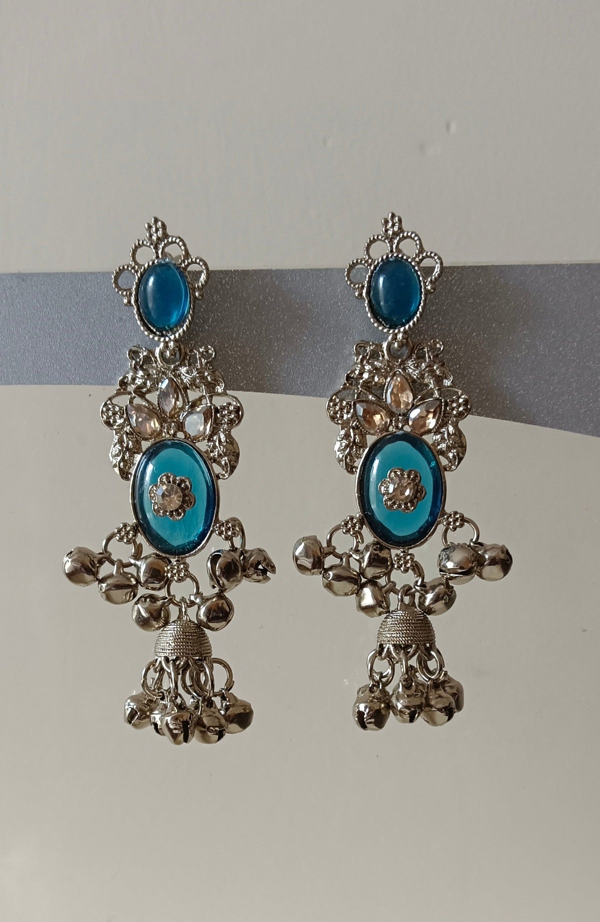 Kundan Studded Blue Brass Sea Luxury Jhumka Earrings