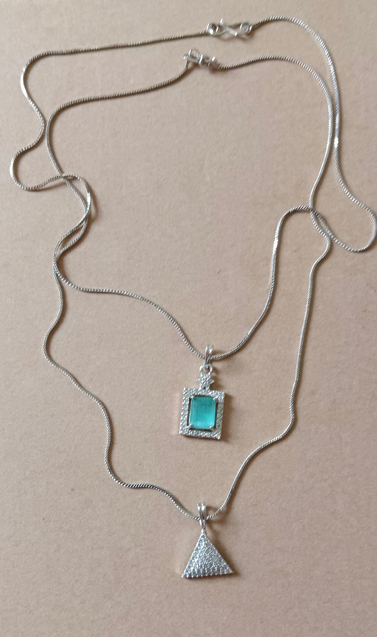 Pack of 2 Pendant Chains with 1 Silver Plated AD Studded Mint Green Pendant and 1 Diamond Triangle Shaped Pendant Chain