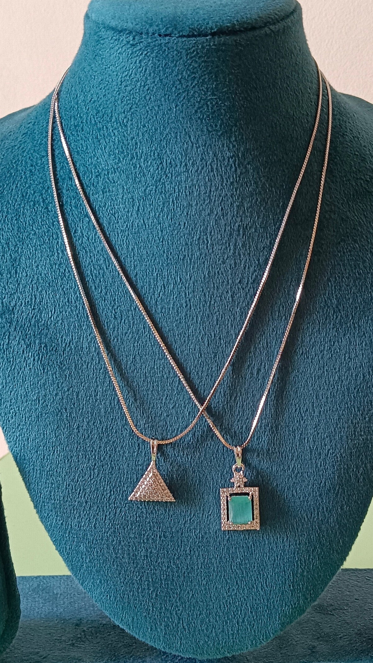 Pack of 2 Pendant Chains with 1 Silver Plated AD Studded Mint Green Pendant and 1 Diamond Triangle Shaped Pendant Chain