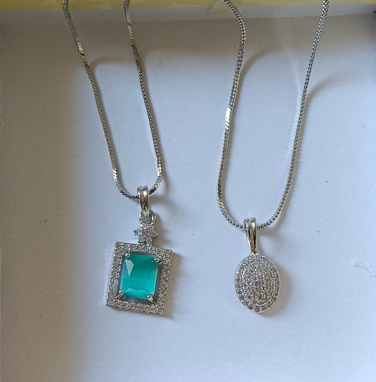 Pack of 2 Pendant Chains with 1 Silver Plated AD Studded Mint Green Pendant and 1 Diamond Oval Shaped Pendant Chain