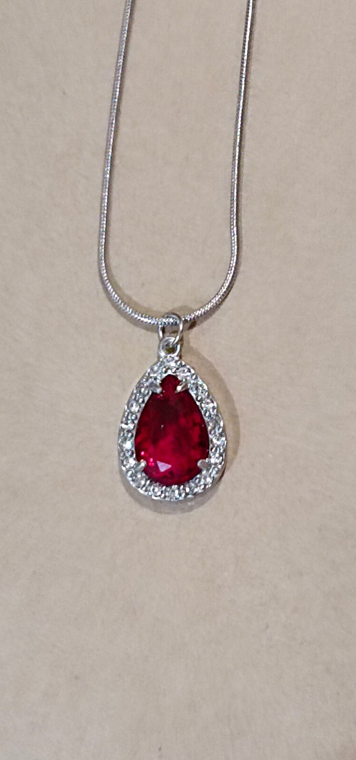 Red Tear Drop Shaped Pendant with Rhinestone Border Stainless Steel Necklace