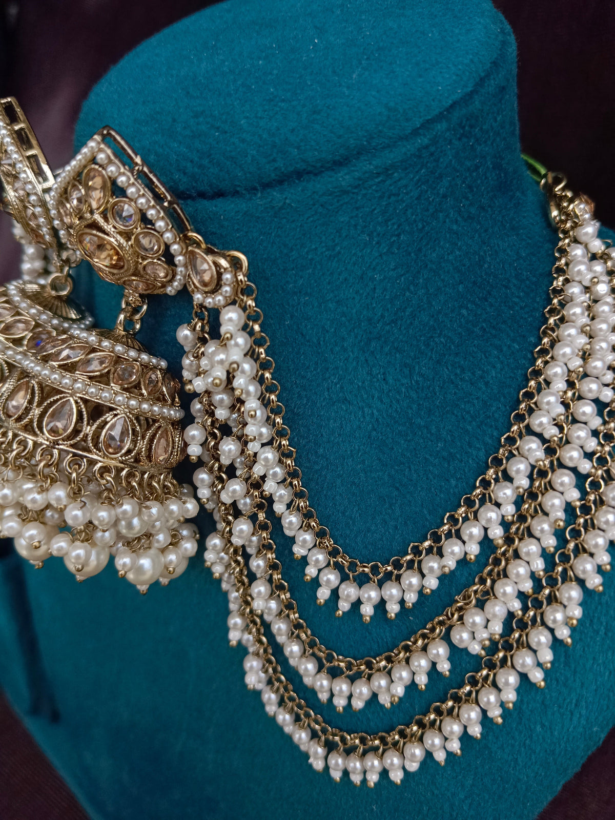 Golden Bahubali Kundan Studded Three Layer Kanchain with White Beads